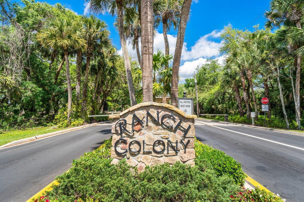 3200 Southeast Downwinds Road Jupiter, FL 33478 - Photo 28 of 28 a sign on the side of the road