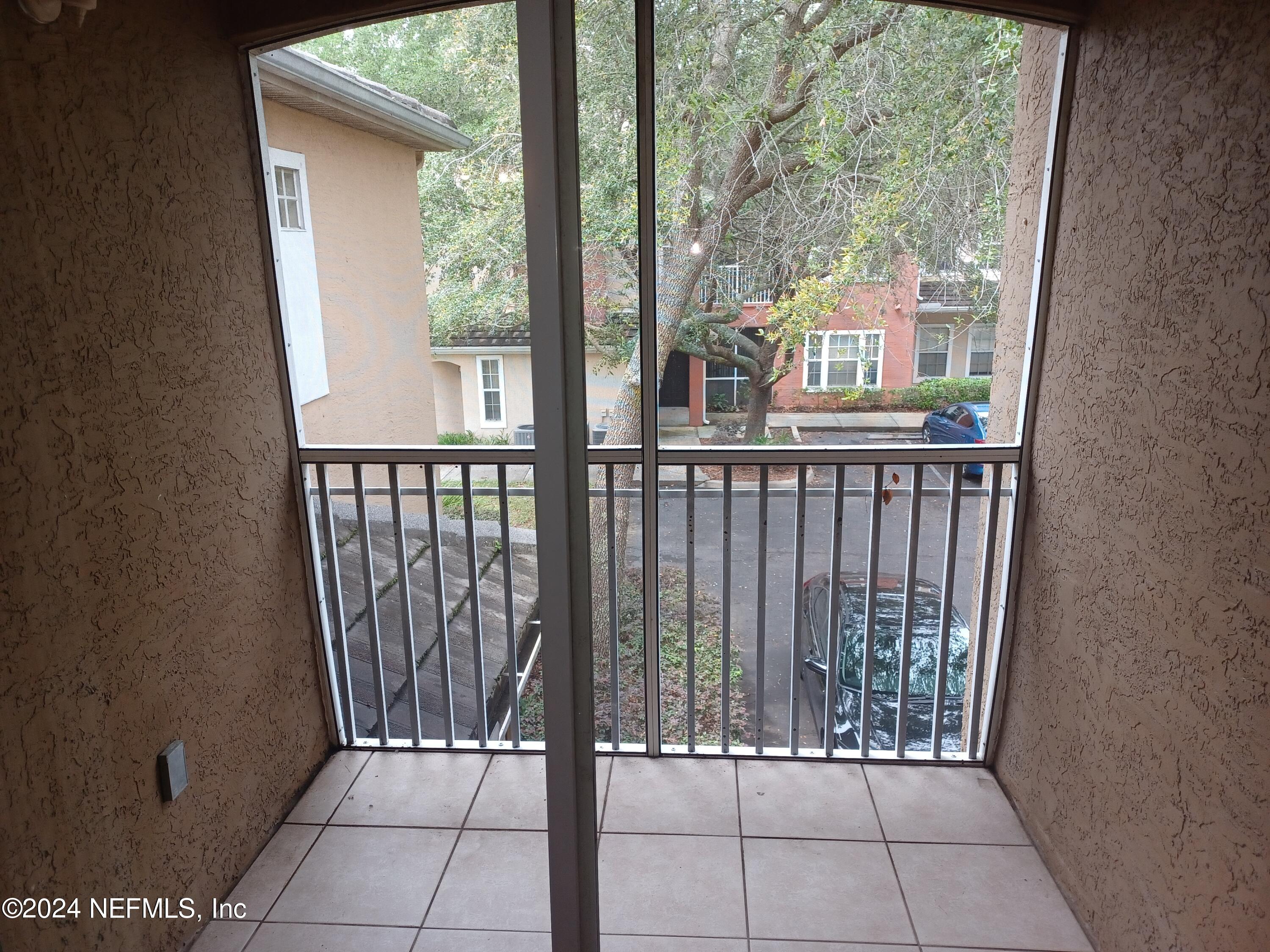 10075 Gate Parkway North, Unit 2406 Jacksonville, FL 32246 - Photo 8 of 25 8 Liv Rm Balcony