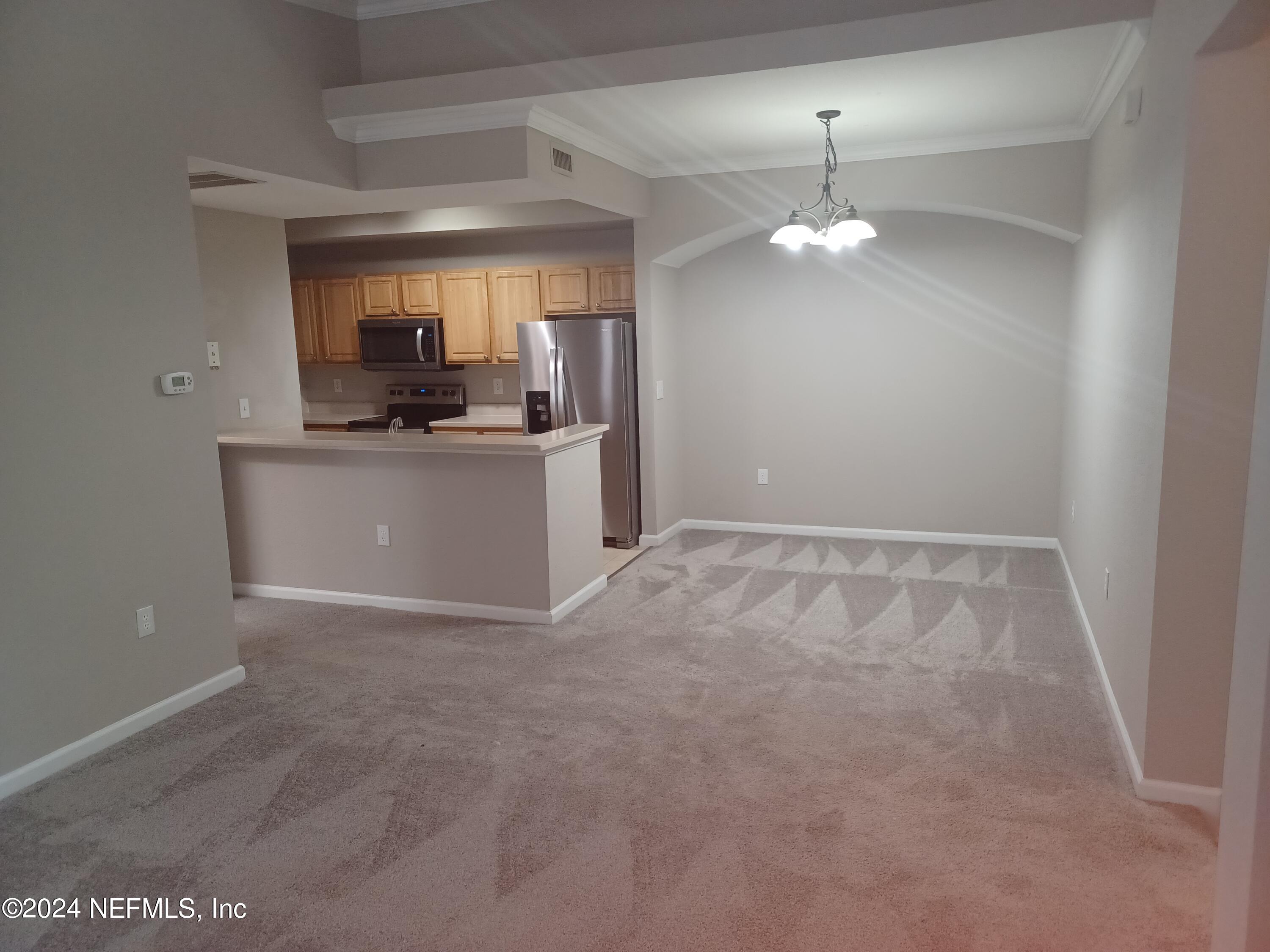 10075 Gate Parkway North, Unit 2406 Jacksonville, FL 32246 - Photo 9 of 25 9 Dining Rm
