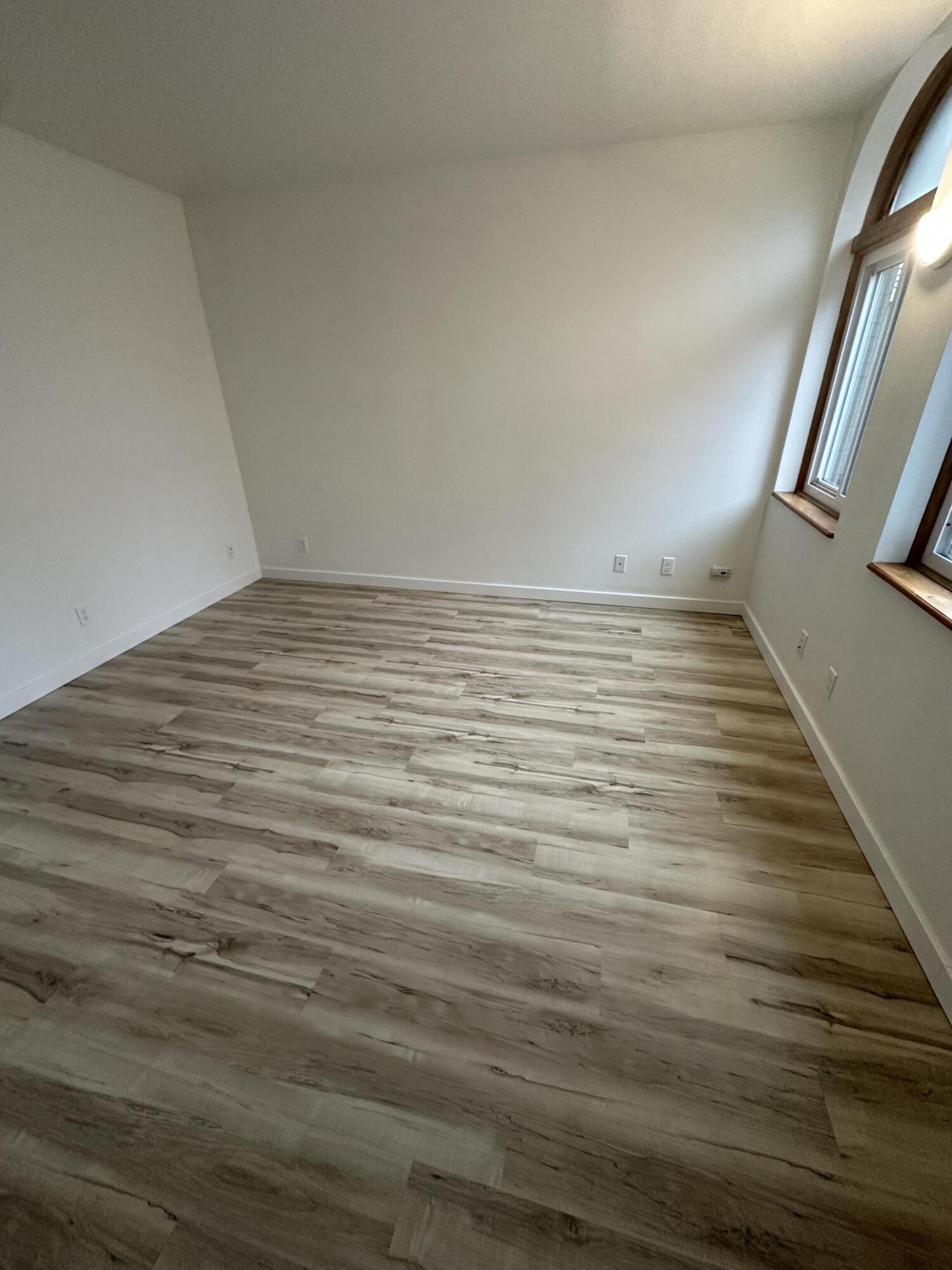 806 Maple Avenue La Porte, IN 46350 - Photo 2 of 9 a view of empty room with wooden floor