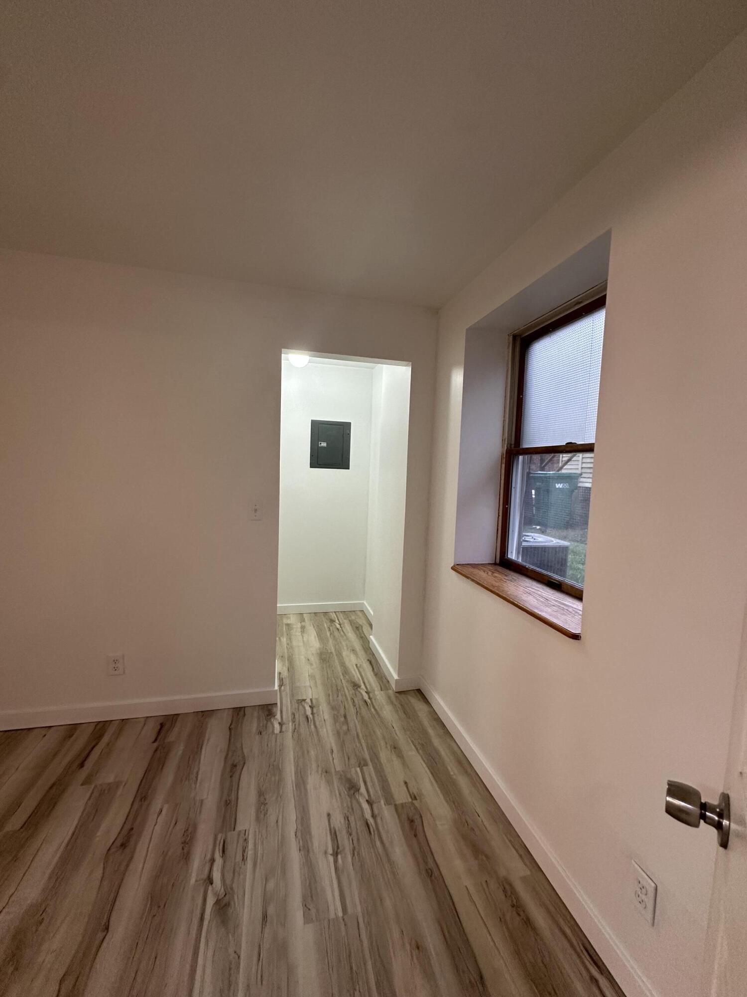 806 Maple Avenue La Porte, IN 46350 - Photo 7 of 9 a view of room with wooden floor and fan