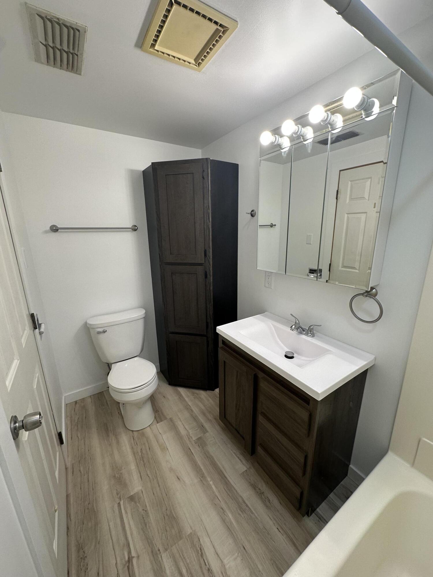 806 Maple Avenue La Porte, IN 46350 - Photo 8 of 9 a bathroom with a sink toilet and shower