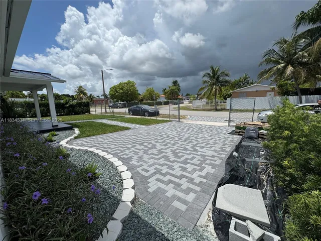 a view of a house with a swimming pool