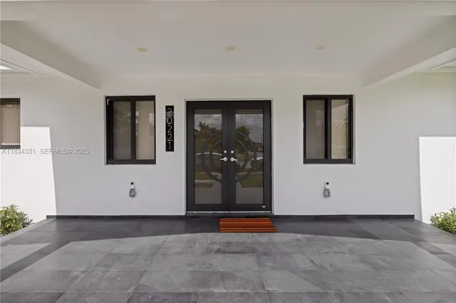 a view of kitchen with furniture and window