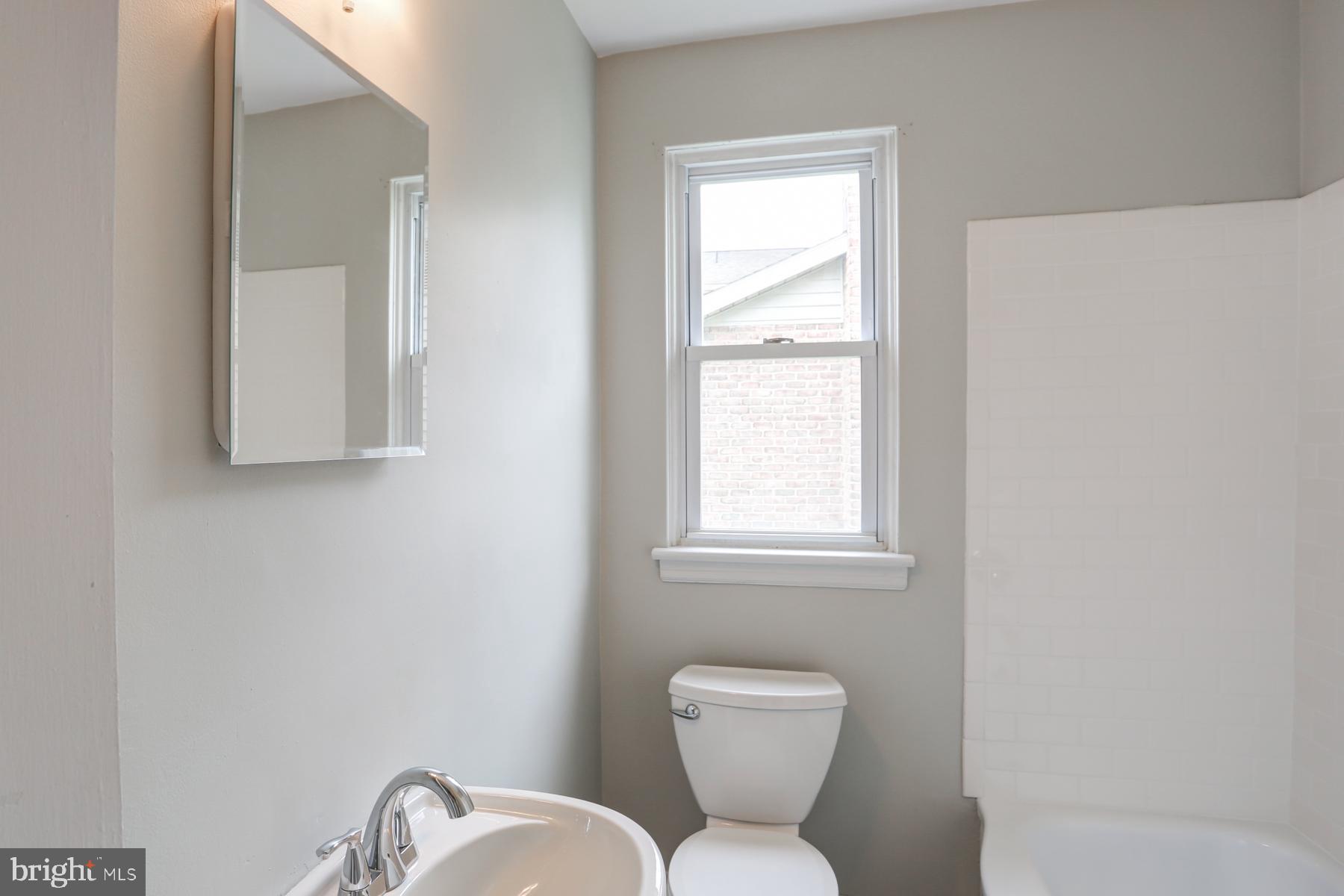 1384 Simpson Ferry Road New Cumberland, PA 17070 - Photo 14 of 23 Full bath w/ new sub way tile surrounding the tub