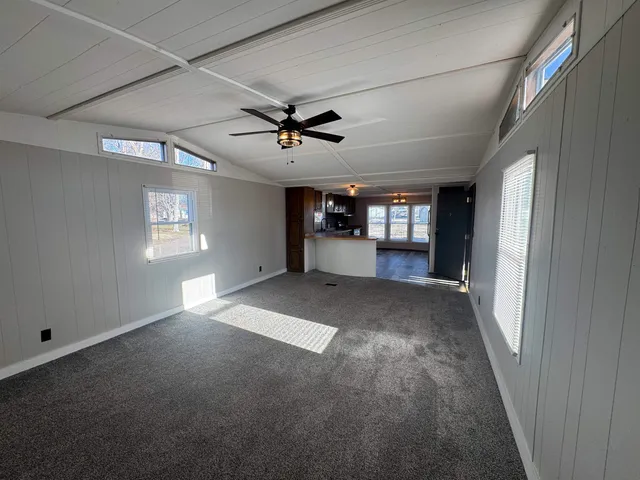 a view of entryway and hall with a window