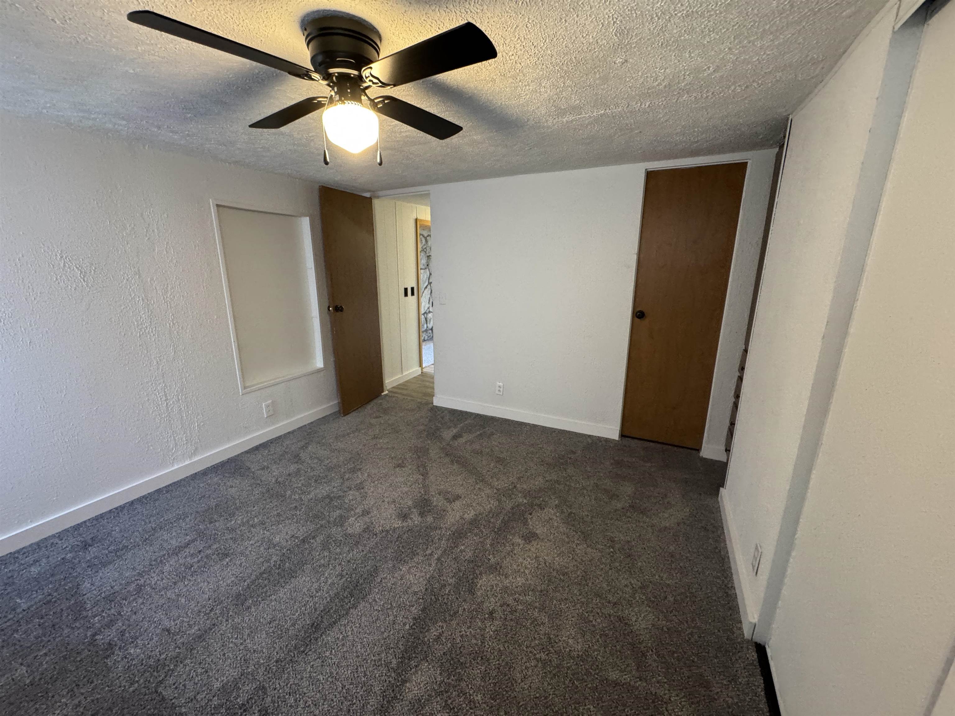 409 West 9th Street Sandoval, IL 62882 - Photo 20 of 31 a view of a livingroom with a ceiling fan
