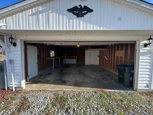 a room with a table and chairs