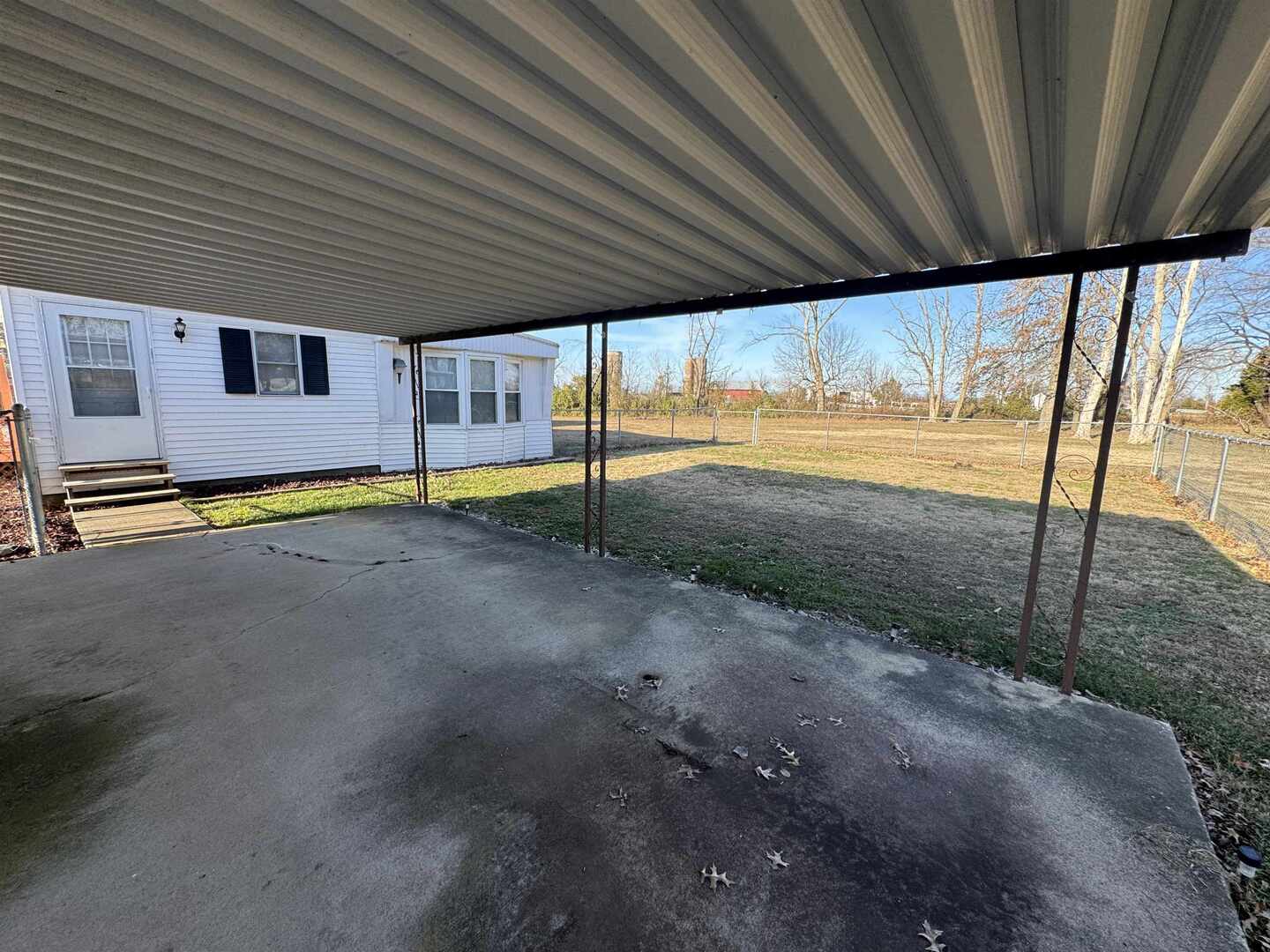 409 West 9th Street Sandoval, IL 62882 - Photo 29 of 31 a view of a house with backyard and sitting area