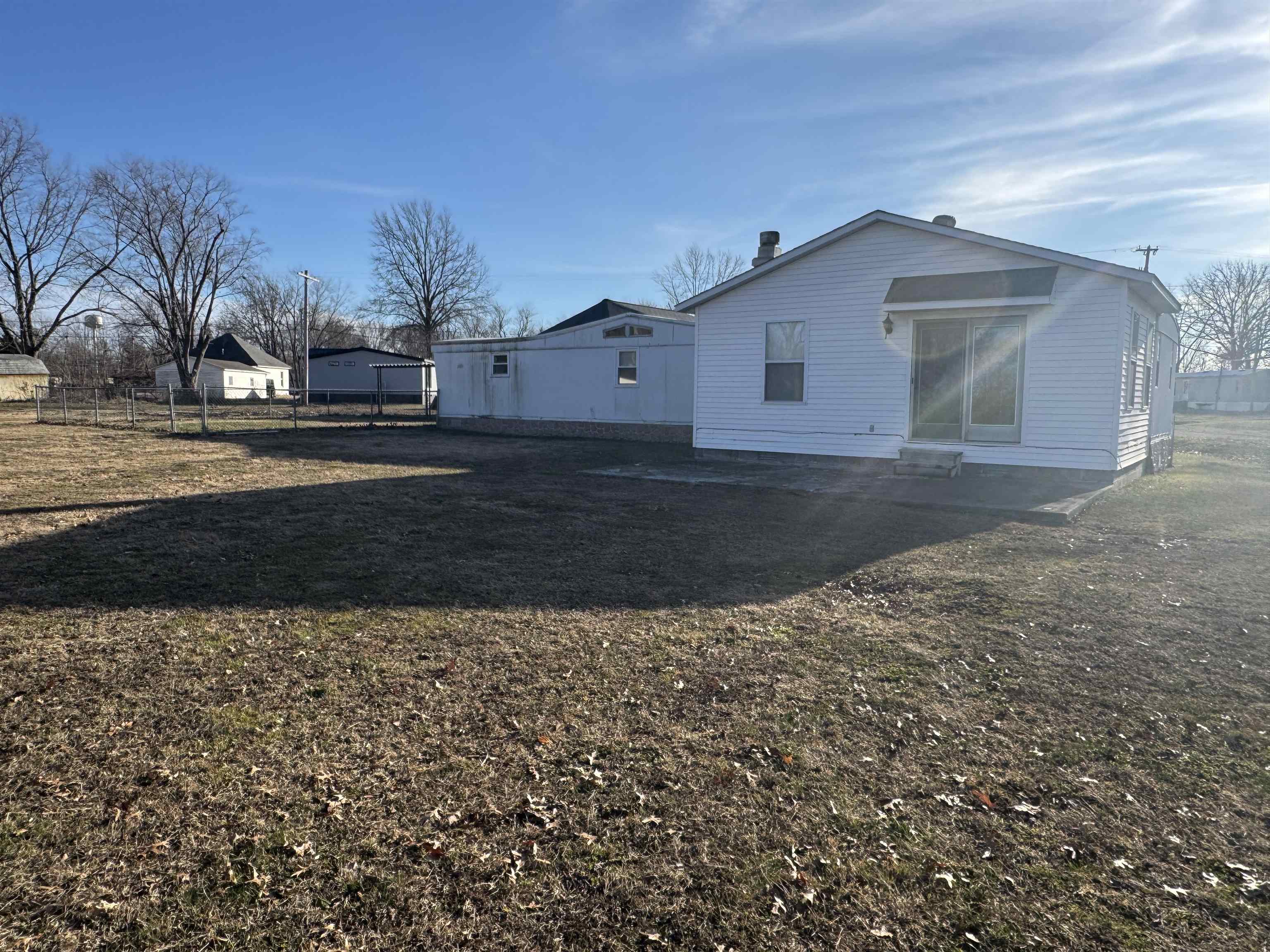 409 West 9th Street Sandoval, IL 62882 - Photo 30 of 31 a view of a house with a yard