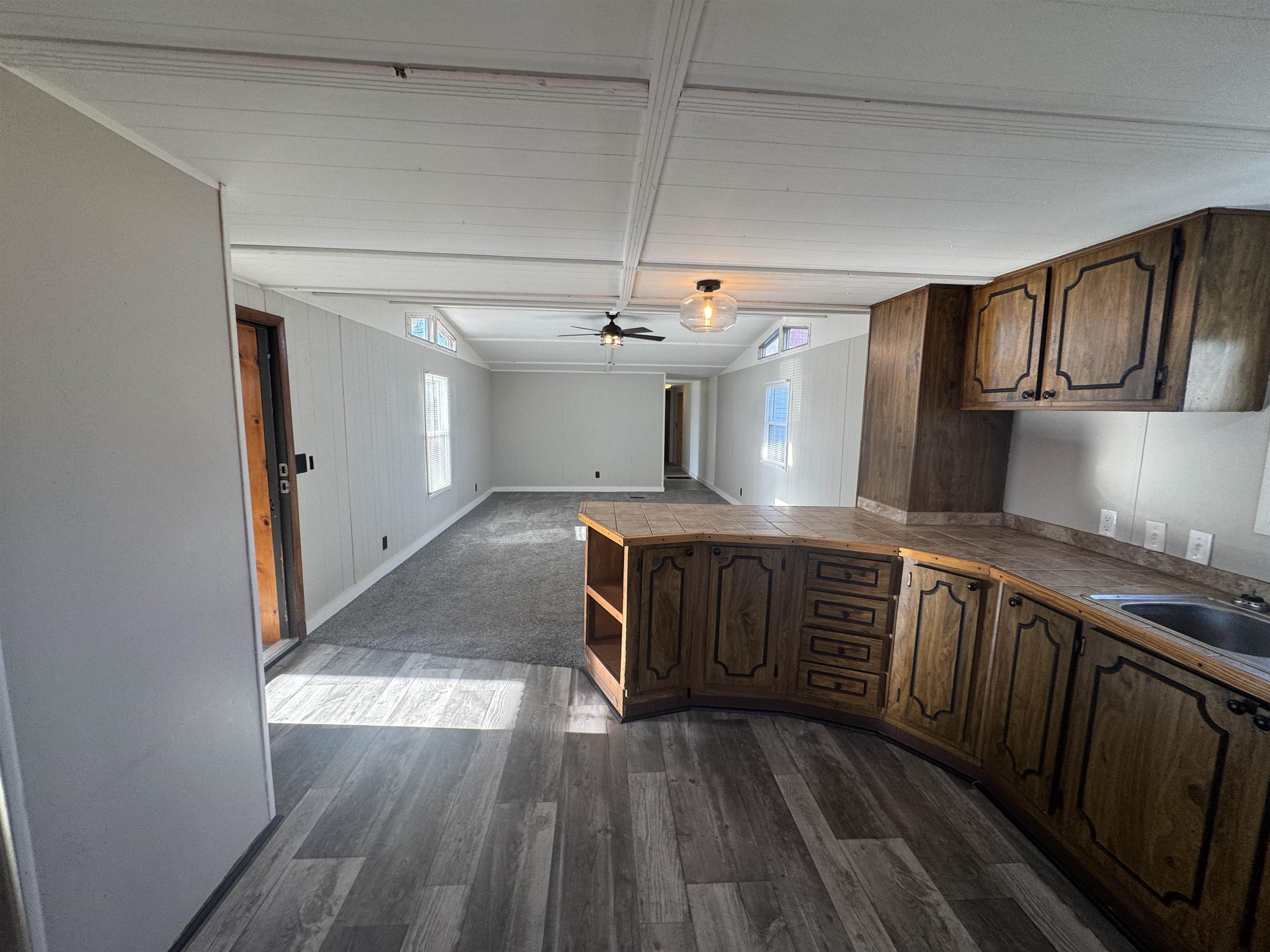 409 West 9th Street Sandoval, IL 62882 - Photo 9 of 31 a kitchen with stainless steel appliances granite countertop a stove a sink and a refrigerator