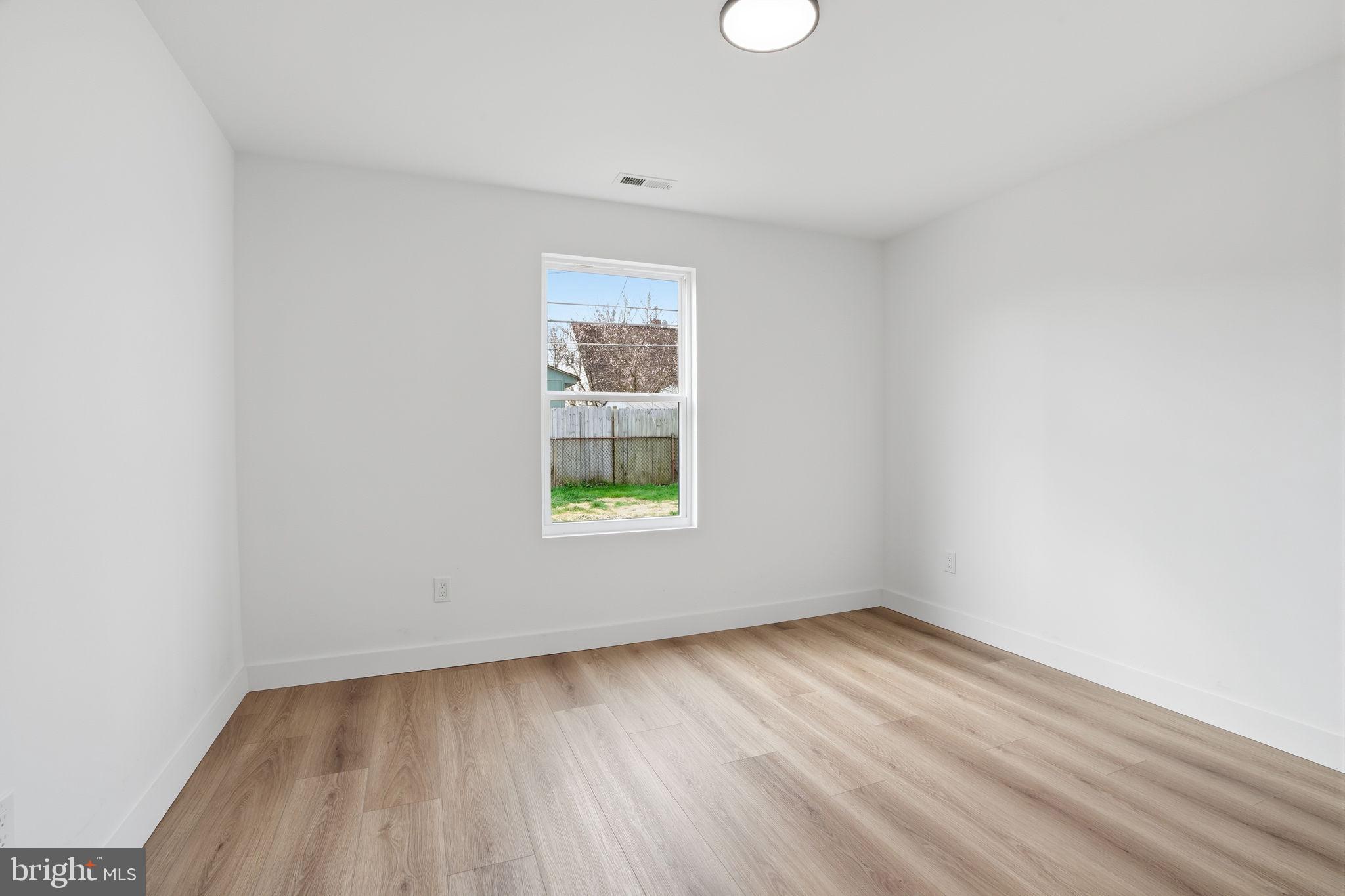 14 Inlet Road Levittown, PA 19057 - Photo 12 of 31 an empty room with a window