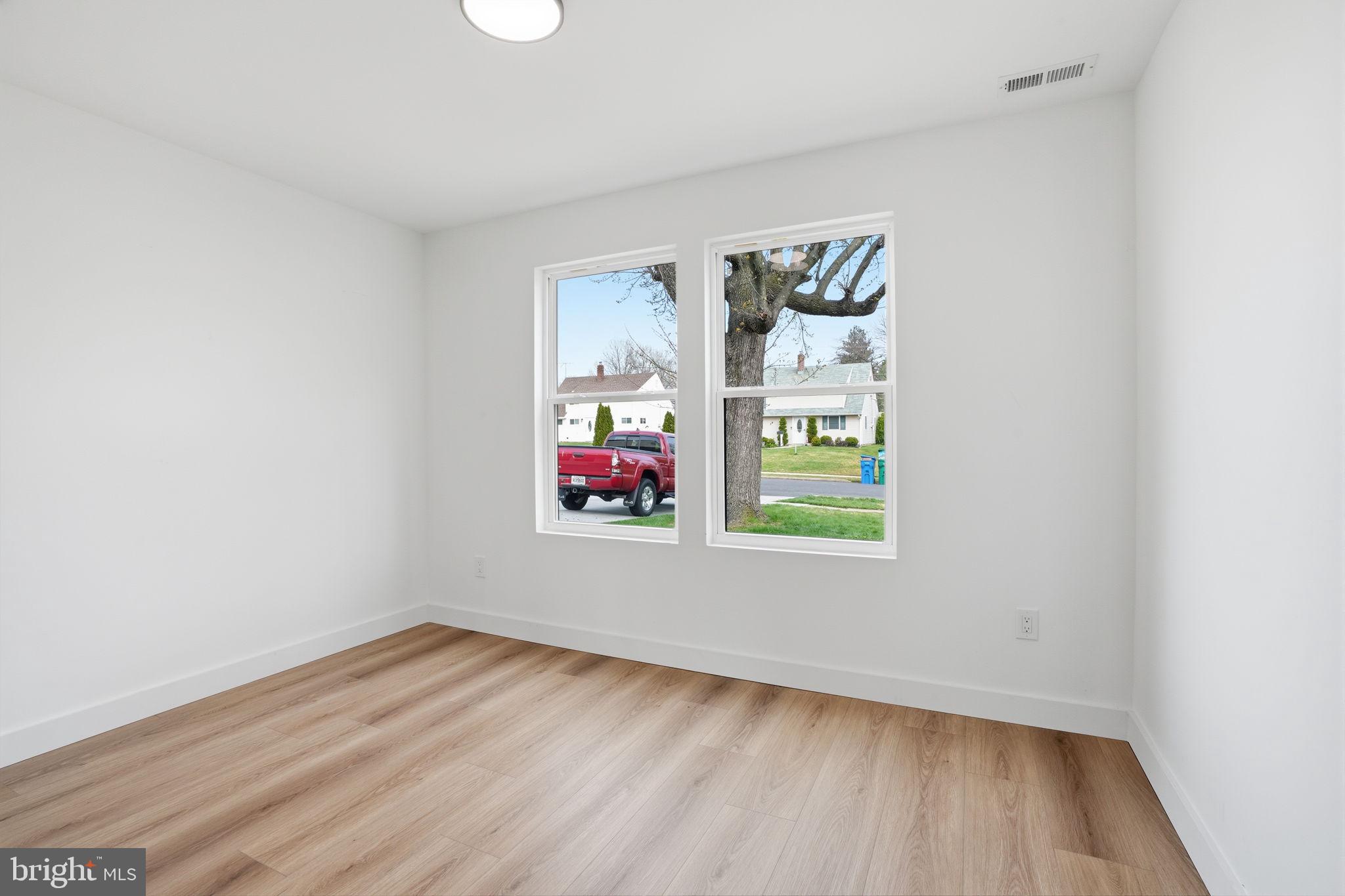 14 Inlet Road Levittown, PA 19057 - Photo 13 of 31 an empty room with a window