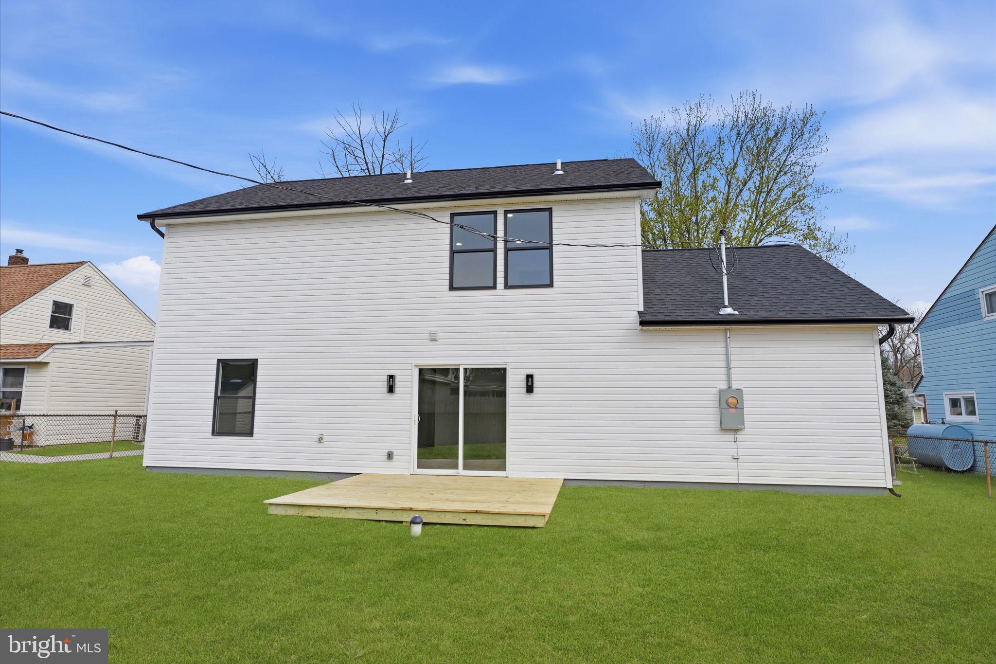 14 Inlet Road Levittown, PA 19057 - Photo 26 of 31 a front view of a house with a yard