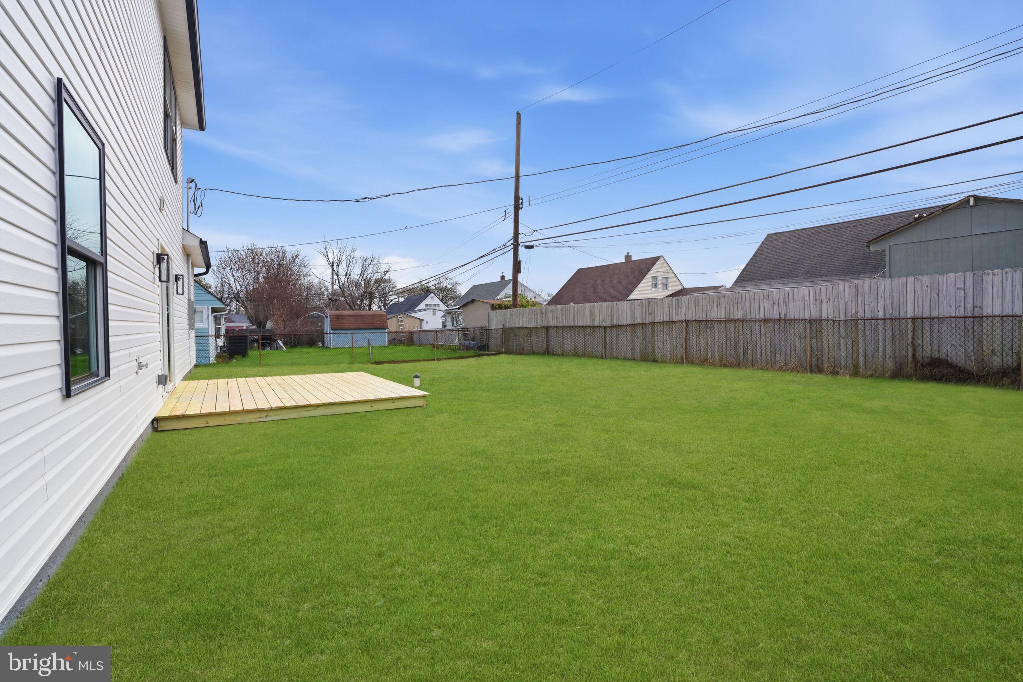 14 Inlet Road Levittown, PA 19057 - Photo 29 of 31 a view of a back yard of the house