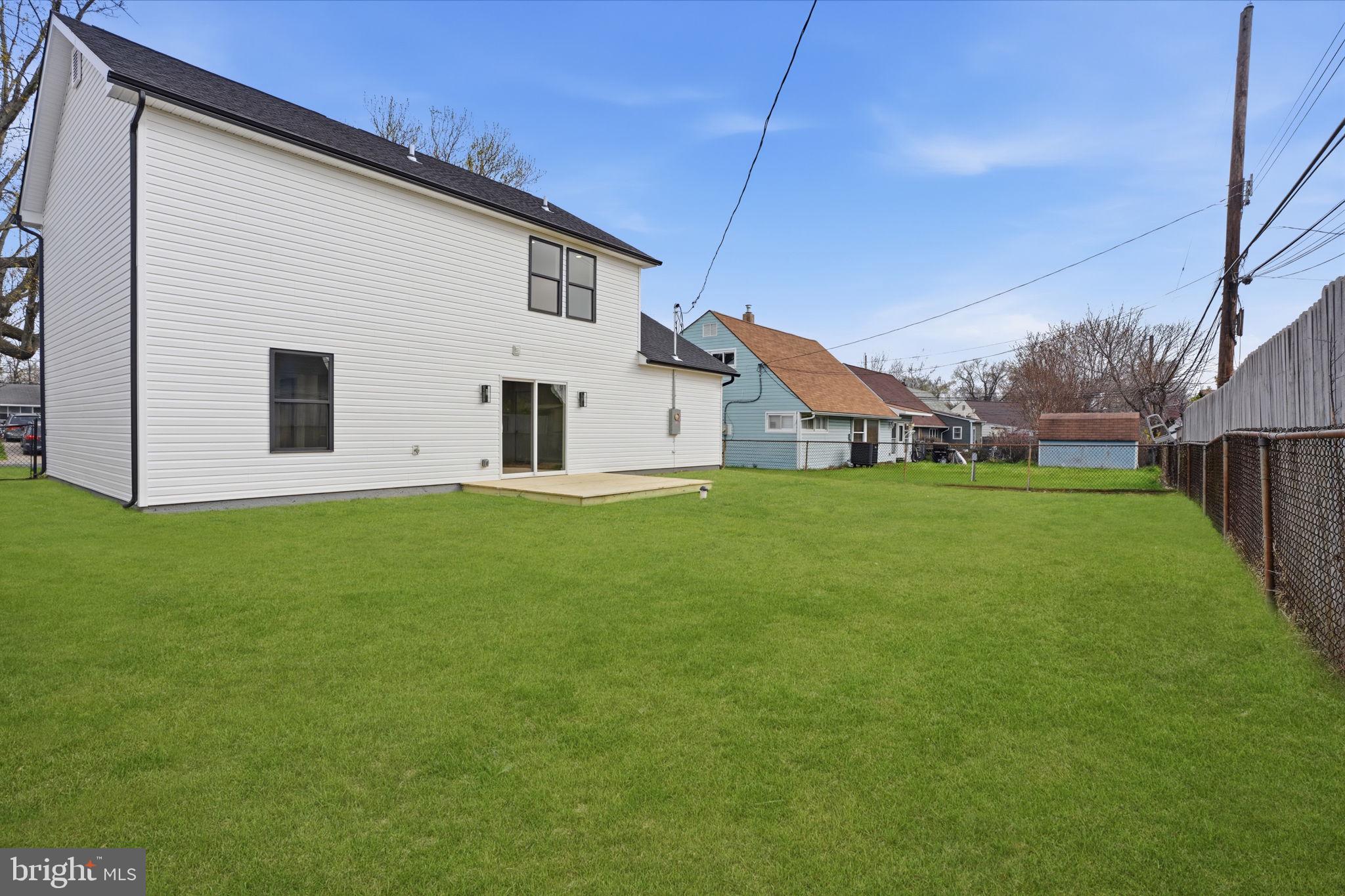 14 Inlet Road Levittown, PA 19057 - Photo 30 of 31 a view of a house with a yard