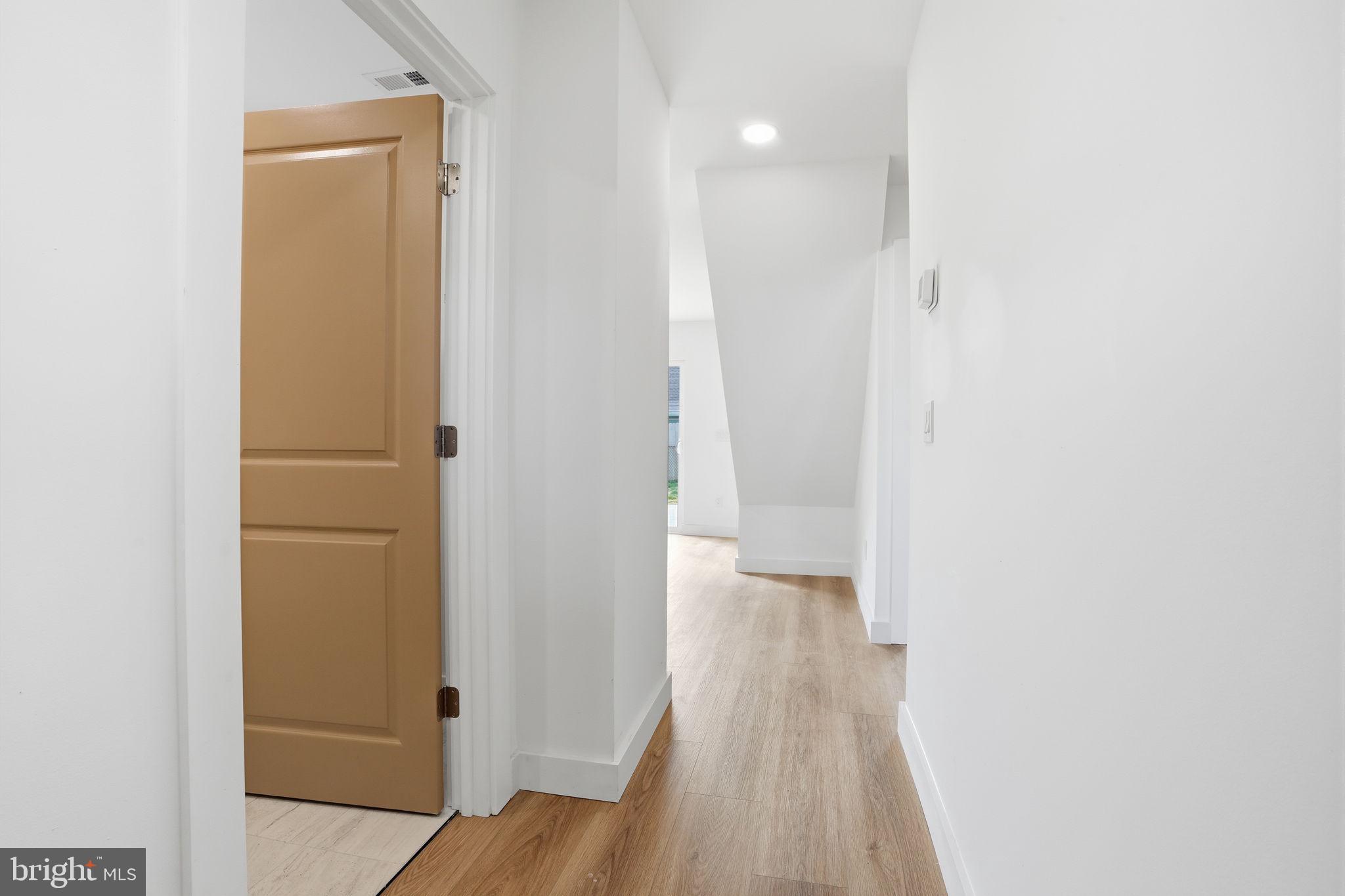 14 Inlet Road Levittown, PA 19057 - Photo 4 of 31 a view of a room with wooden floor