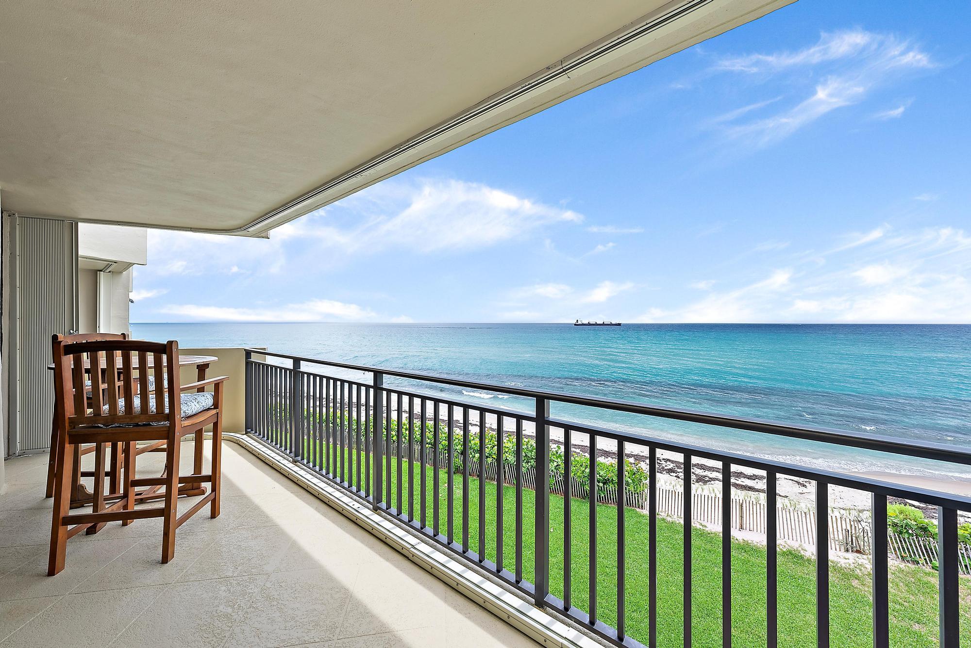 a view of balcony with furniture