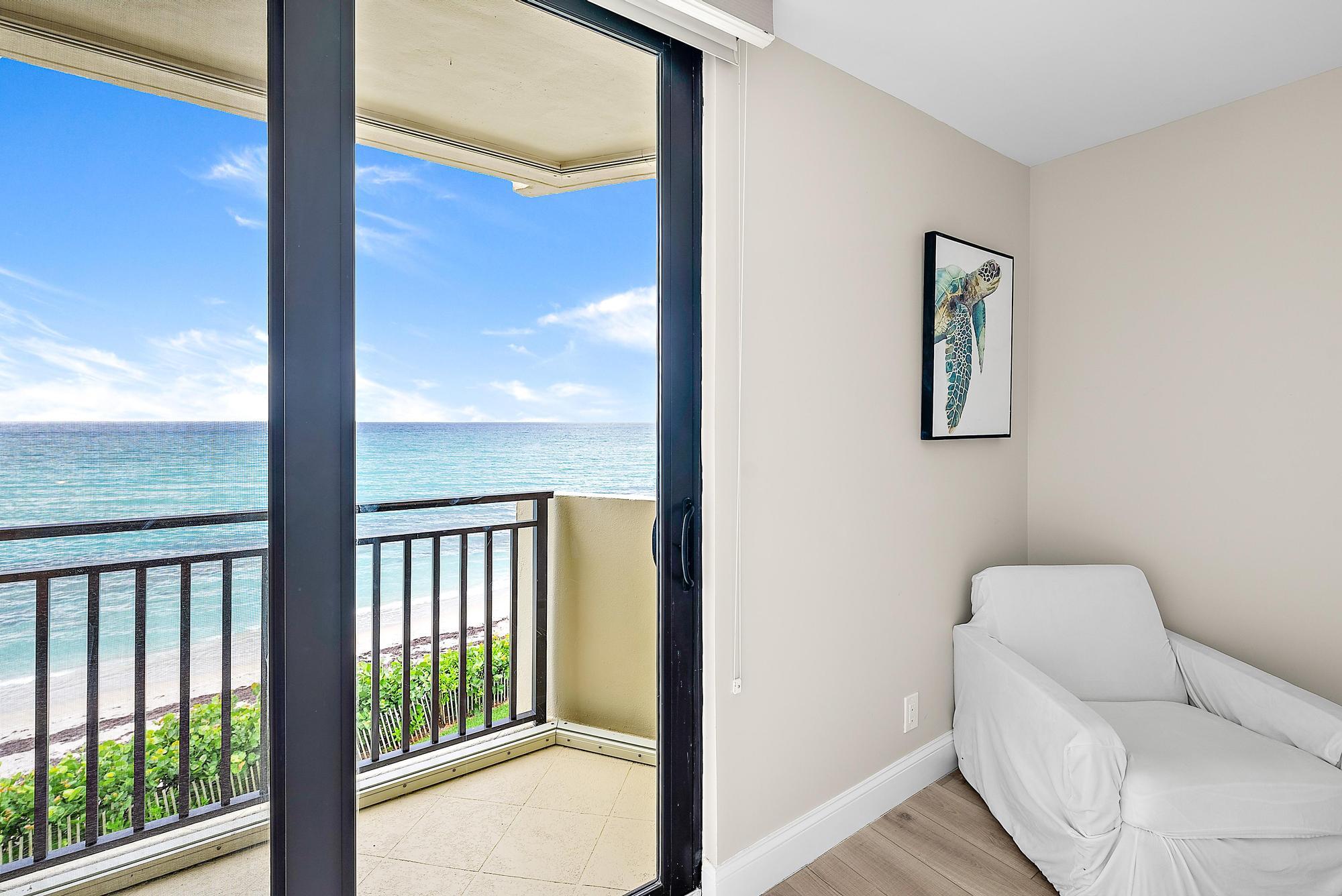 5460 North Ocean Drive, Unit 3B Riviera Beach, FL 33404 - Photo 19 of 26 a balcony with a couch