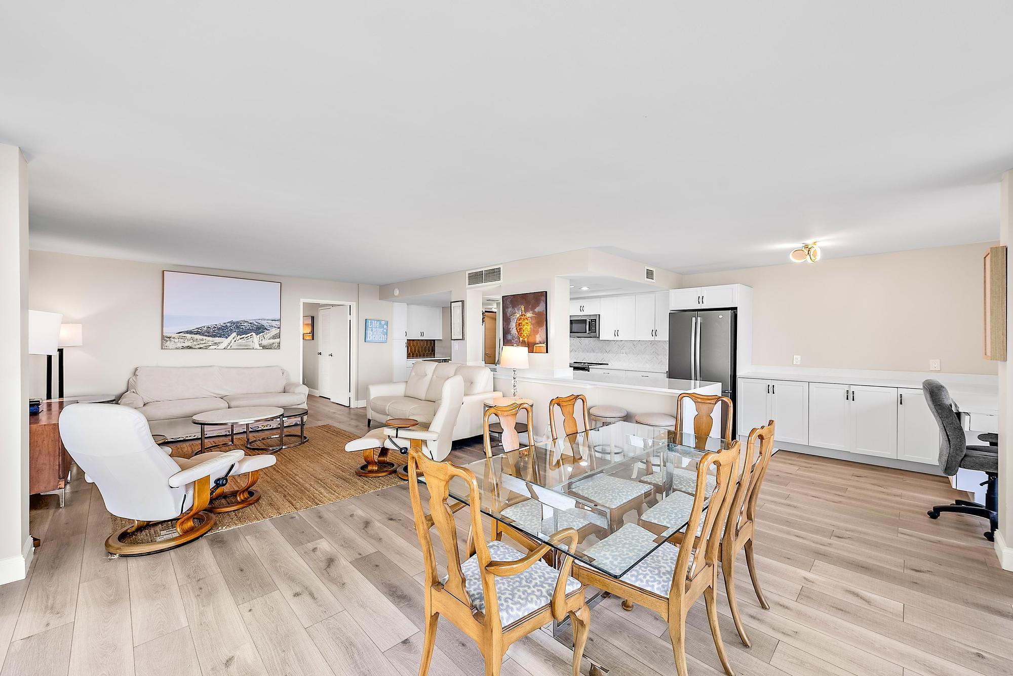 5460 North Ocean Drive, Unit 3B Riviera Beach, FL 33404 - Photo 9 of 26 a living room with furniture and a wooden floor