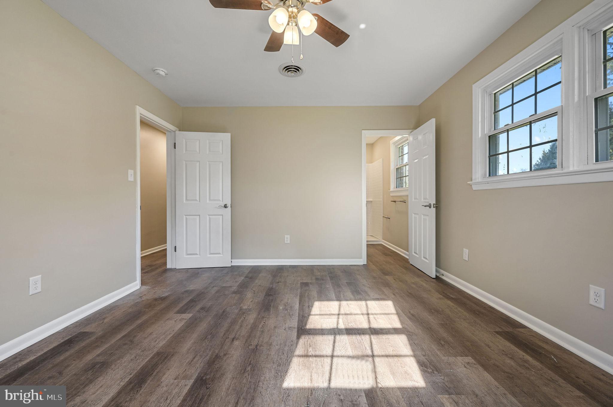 201 North Old Mill Road Dover, DE 19901 - Photo 15 of 27 wooden floor in an empty room with a window