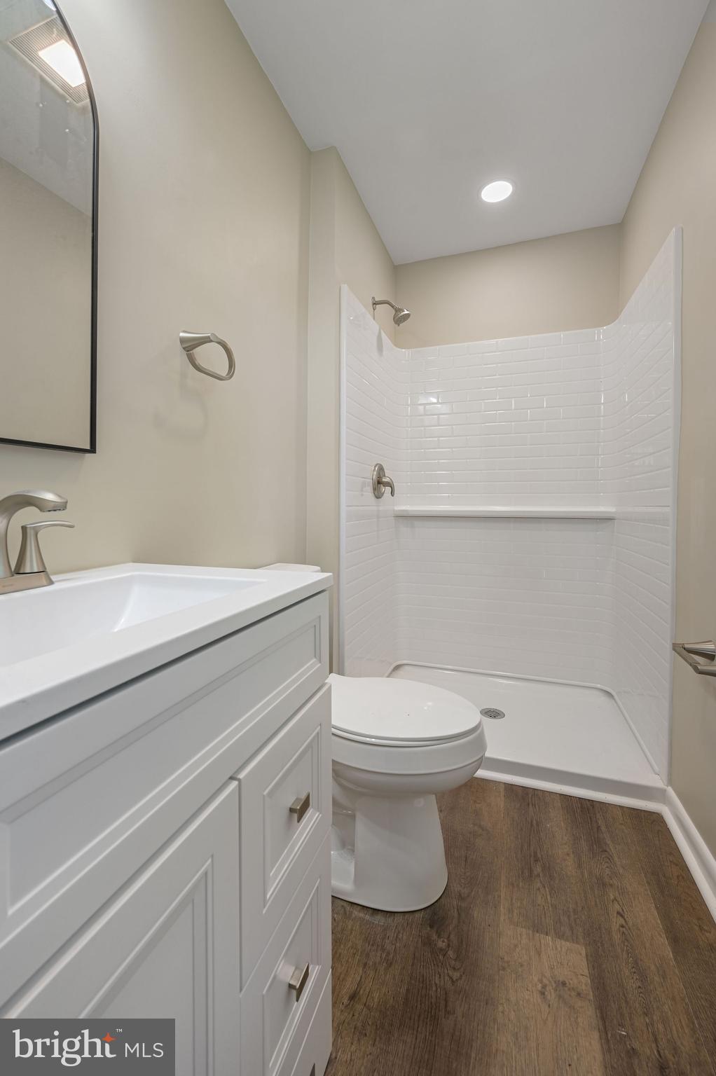 201 North Old Mill Road Dover, DE 19901 - Photo 16 of 27 a bathroom with a sink a toilet and shower