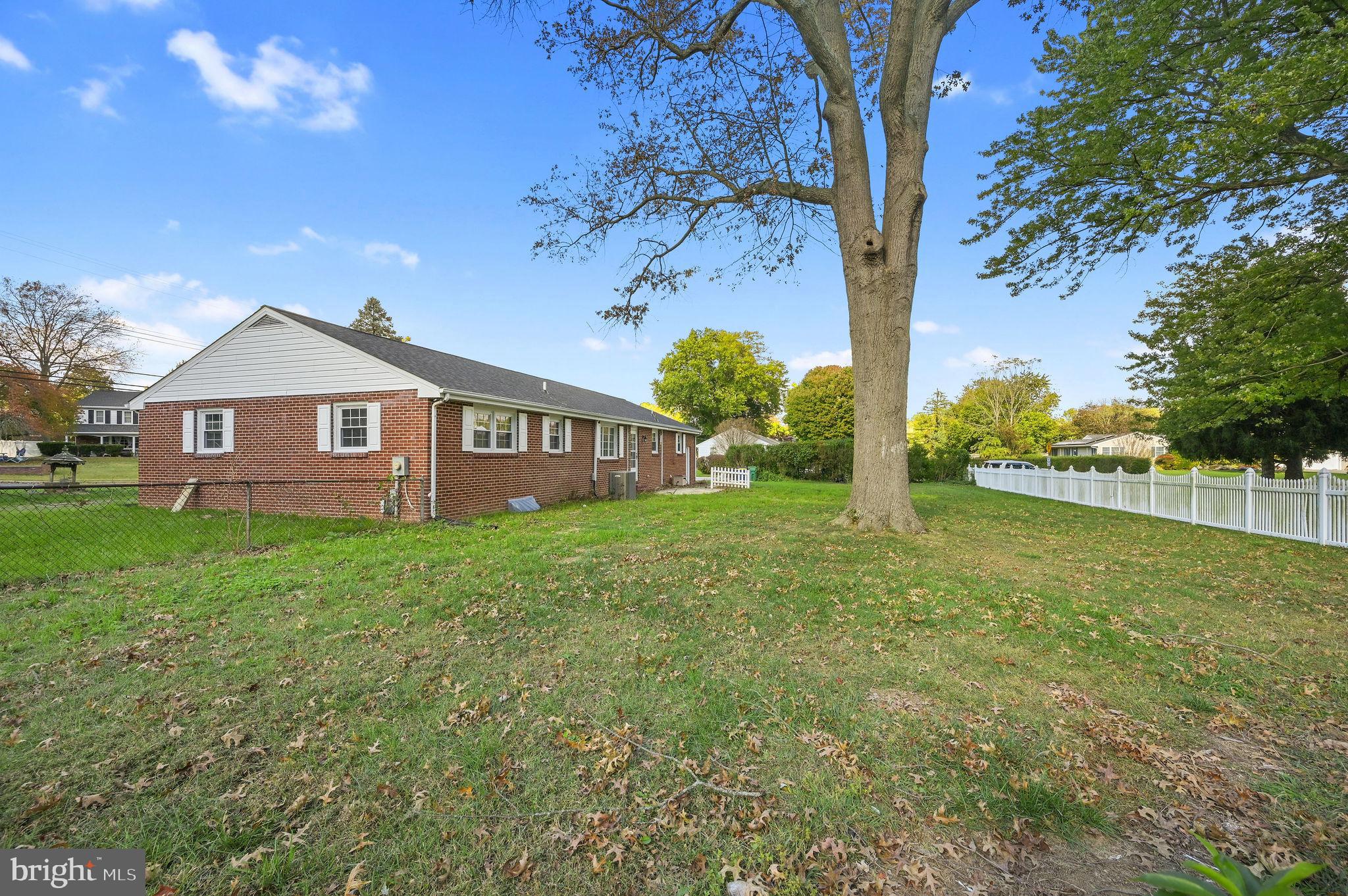 201 North Old Mill Road Dover, DE 19901 - Photo 25 of 27 a view of a big house with a big yard