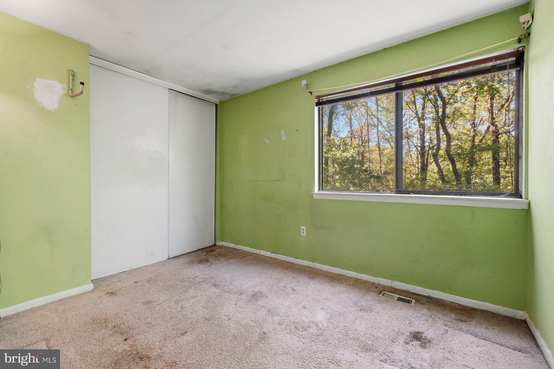 10669 Spring Oak Court Burke, VA 22015 - Photo 18 of 30 Bright, airy room with nature views.