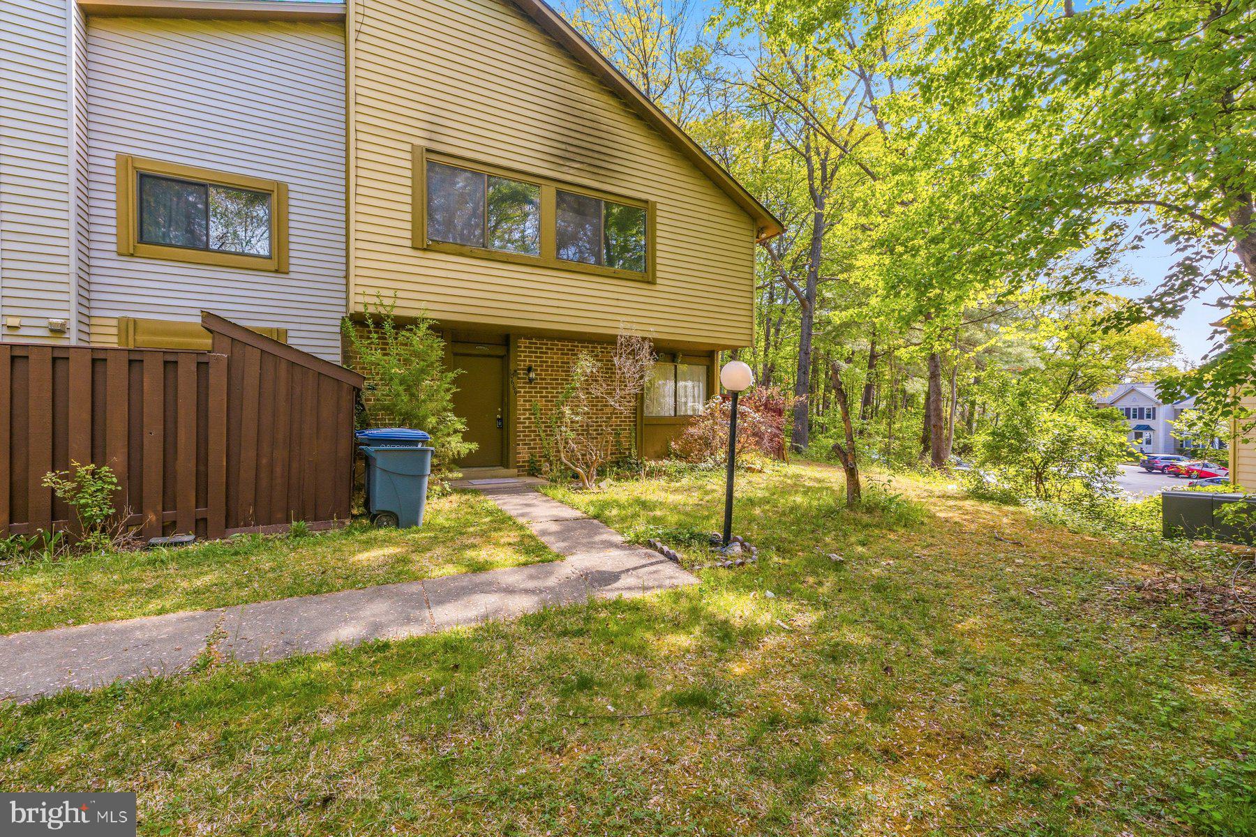 10669 Spring Oak Court Burke, VA 22015 - Photo 2 of 30 Charming home nestled in lush greenery.