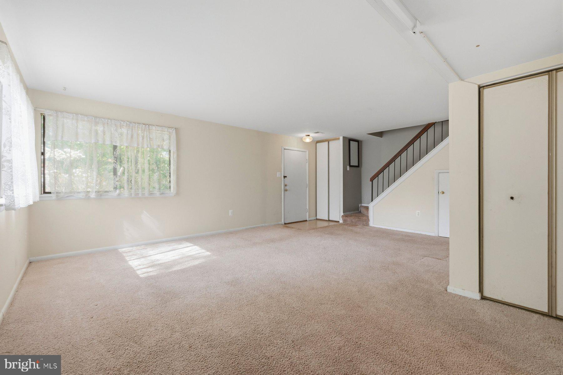 10669 Spring Oak Court Burke, VA 22015 - Photo 4 of 30 Spacious, sunlit living area awaits you.