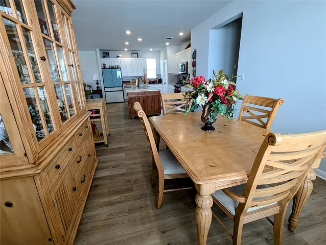 a bathroom with a double vanity sink and mirror