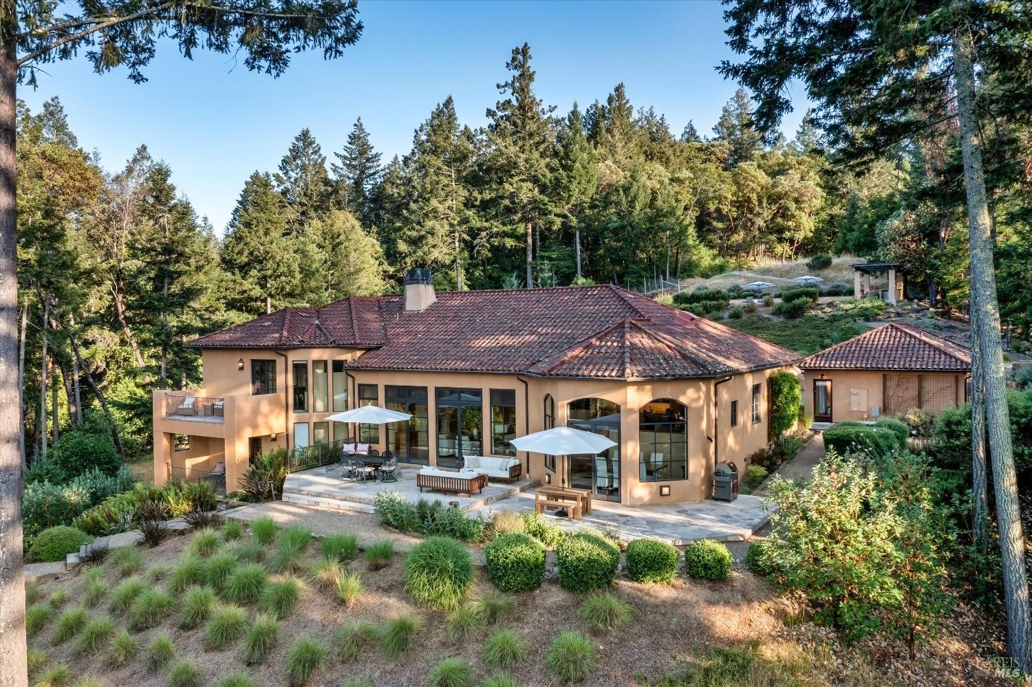 1315 West Dry Creek Road Healdsburg, CA 95448 - Photo 2 of 57 a front view of a house with swimming pool and porch