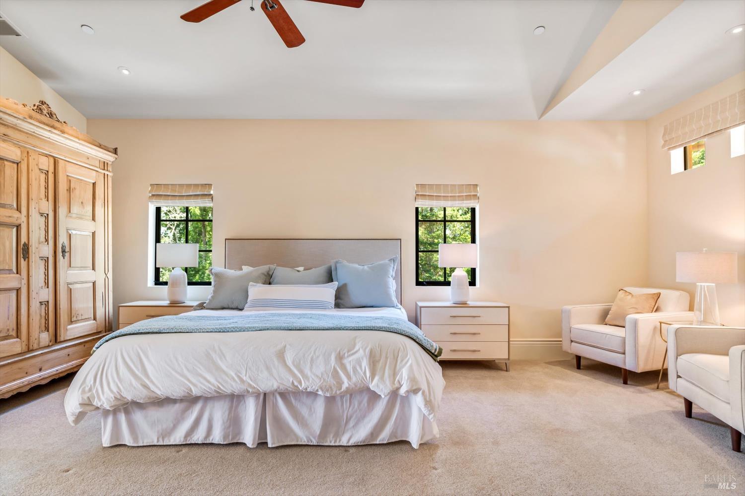 1315 West Dry Creek Road Healdsburg, CA 95448 - Photo 22 of 57 a bedroom with furniture and windows