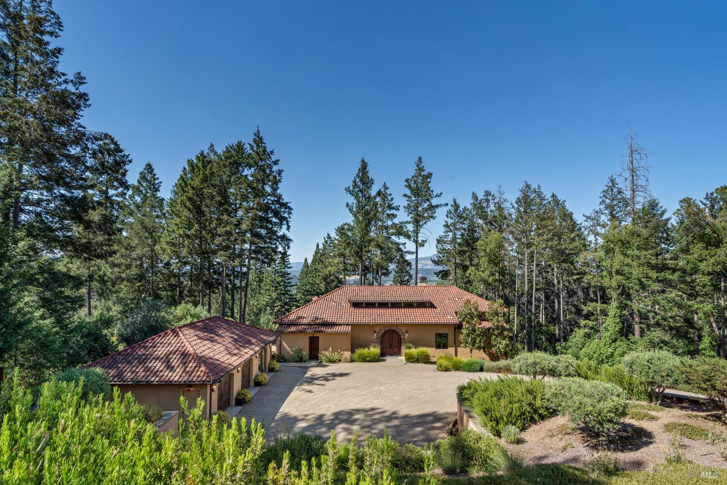 1315 West Dry Creek Road Healdsburg, CA 95448 - Photo 31 of 57 a view of a patio with furniture and a yard