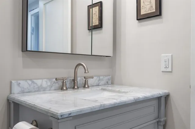a view of a livingroom with furniture and window