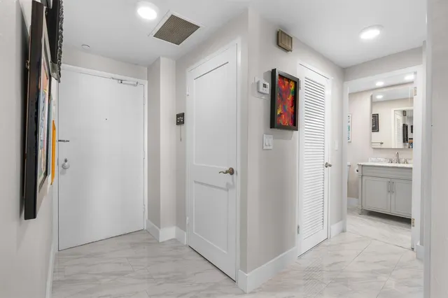 a bedroom with a bed and furniture