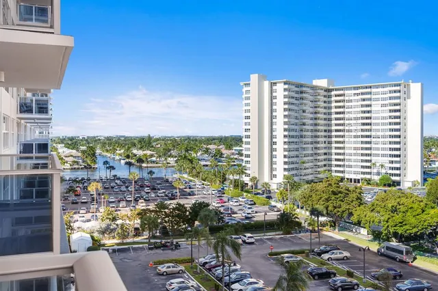 a room with gym equipment and a large window