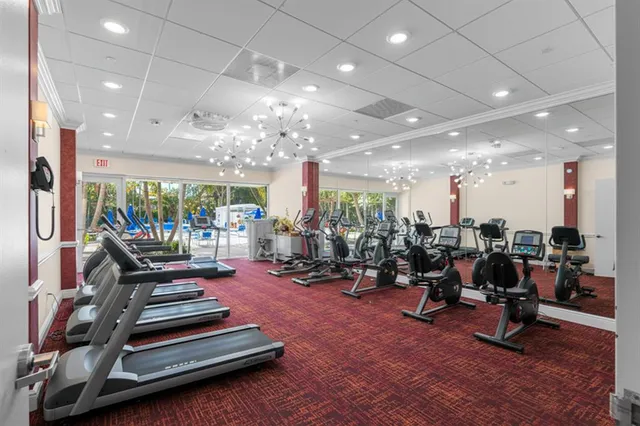 a swimming pool with outdoor seating and yard