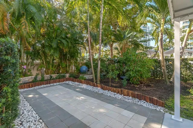 a view of a swimming pool with a deck