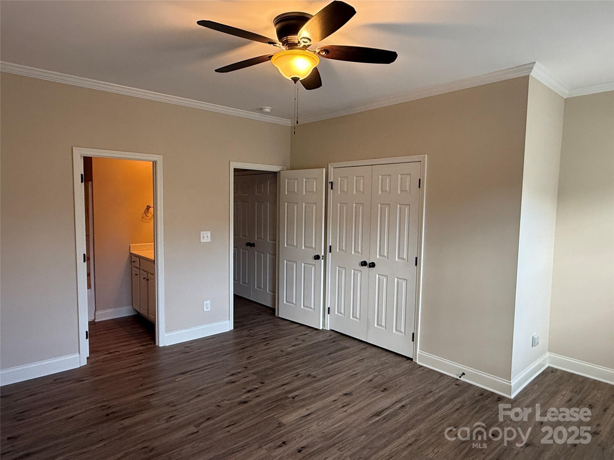 371 Beacon Street Northwest Concord, NC 28027 - Photo 7 of 16 a view of an empty room and wooden floor