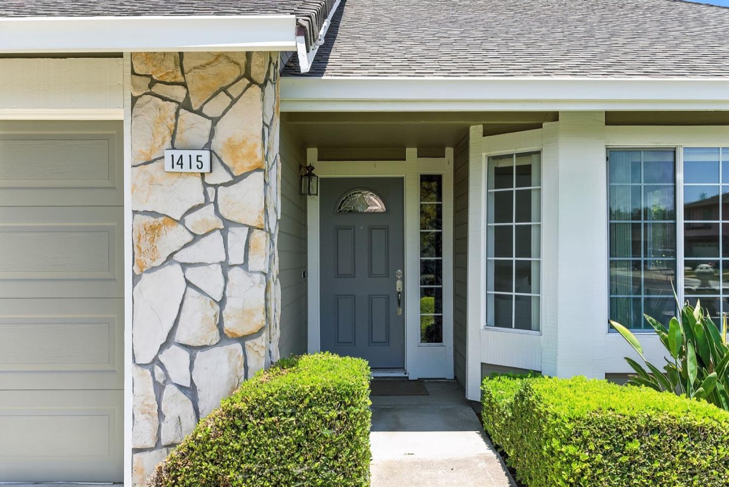 1415 Quail Walk Drive Gilroy, CA 95020 - Photo 3 of 29 a front view of a house with a glass door