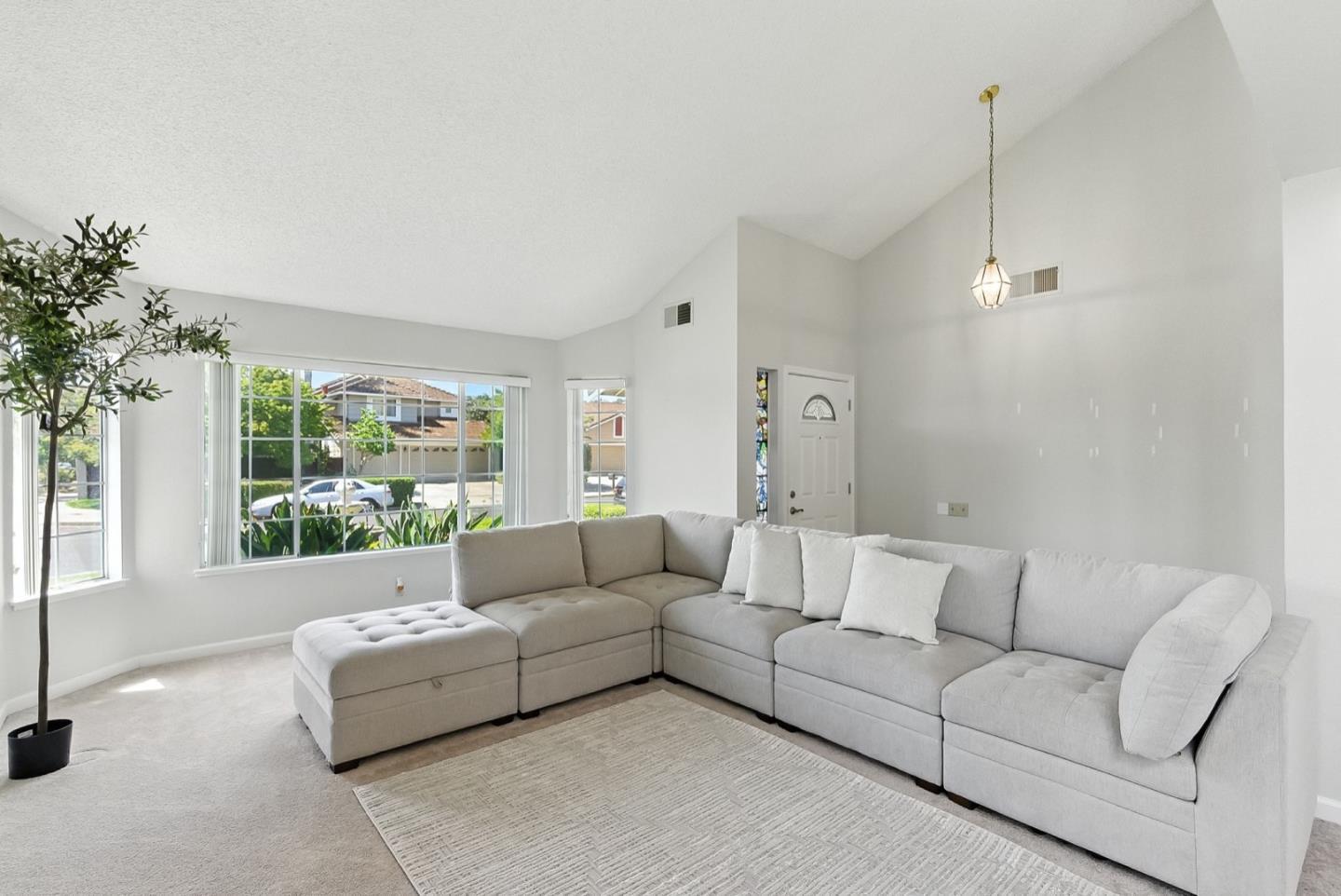 1415 Quail Walk Drive Gilroy, CA 95020 - Photo 6 of 29 a living room with furniture and a large window