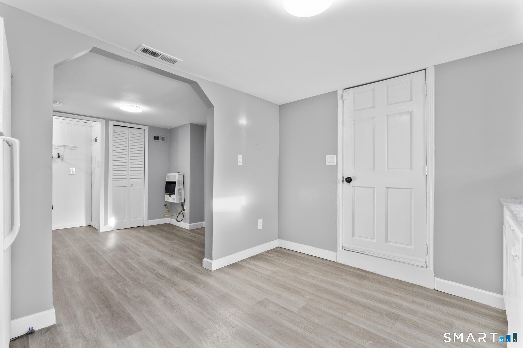 257 North State Street Ansonia, CT 06401 - Photo 25 of 36 a view of an empty room and wooden floor