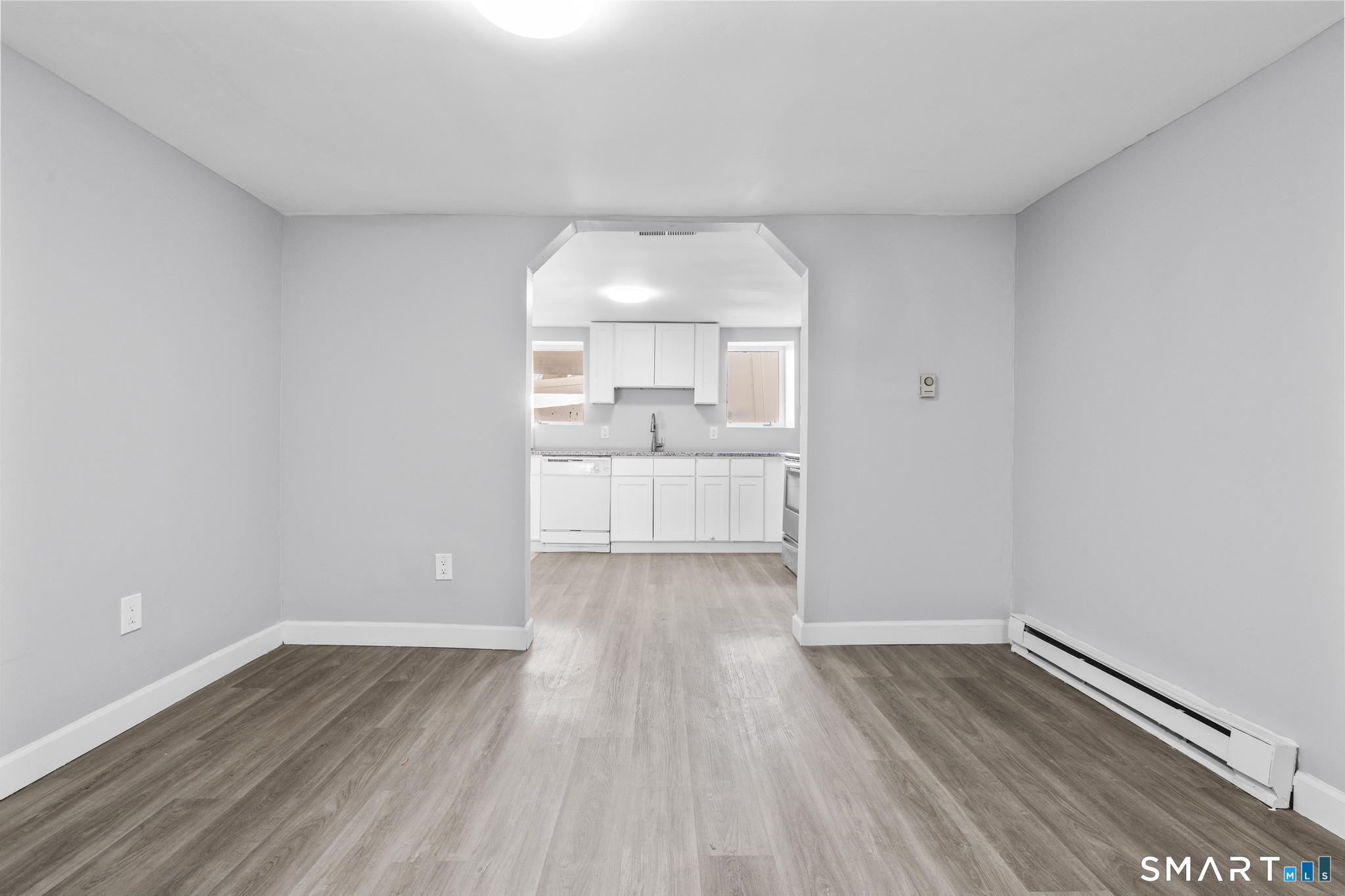 257 North State Street Ansonia, CT 06401 - Photo 28 of 36 a view of a room with wooden floor and white walls
