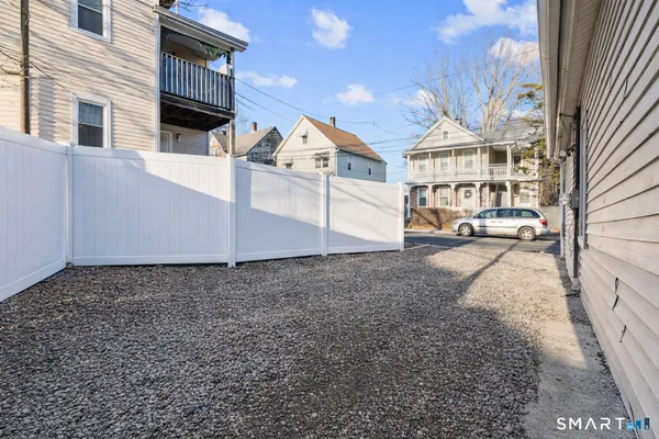 a view of a back yard of the house