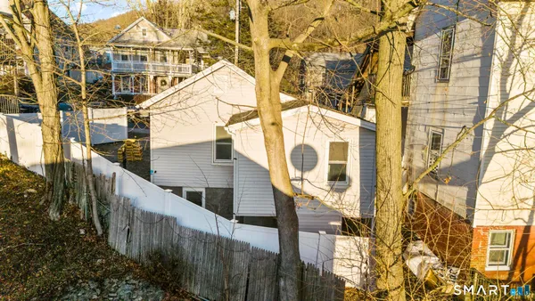 a view of a house with a street