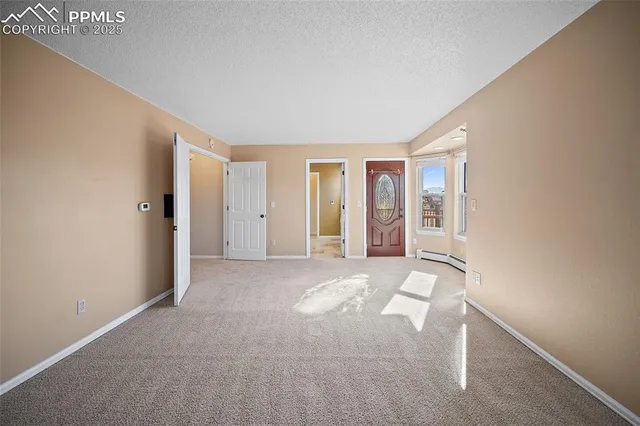 a view of an entryway with sitting space