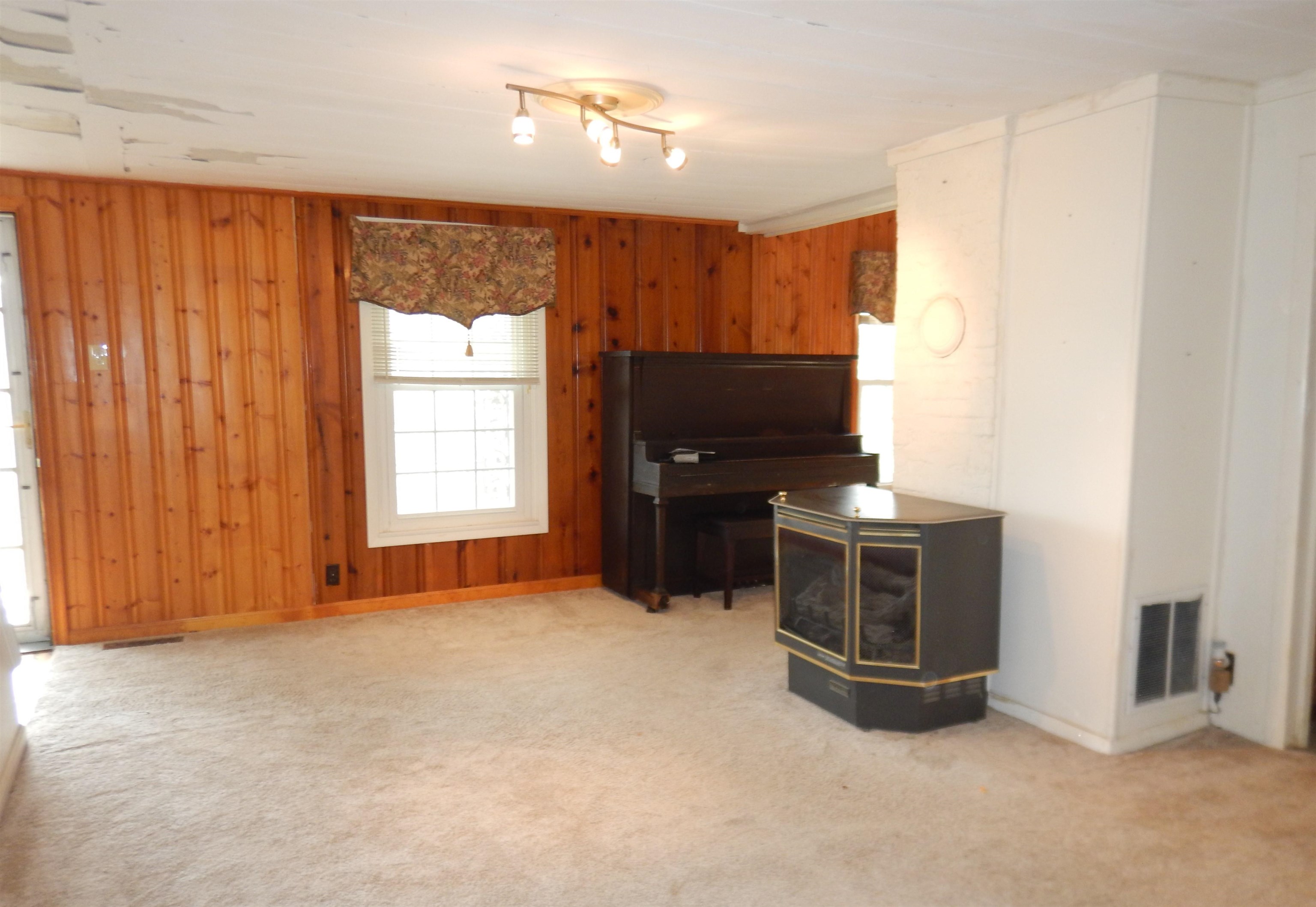 941 McKinley Road Middlebrook, VA 24459 - Photo 11 of 25 a view of an empty room with a window