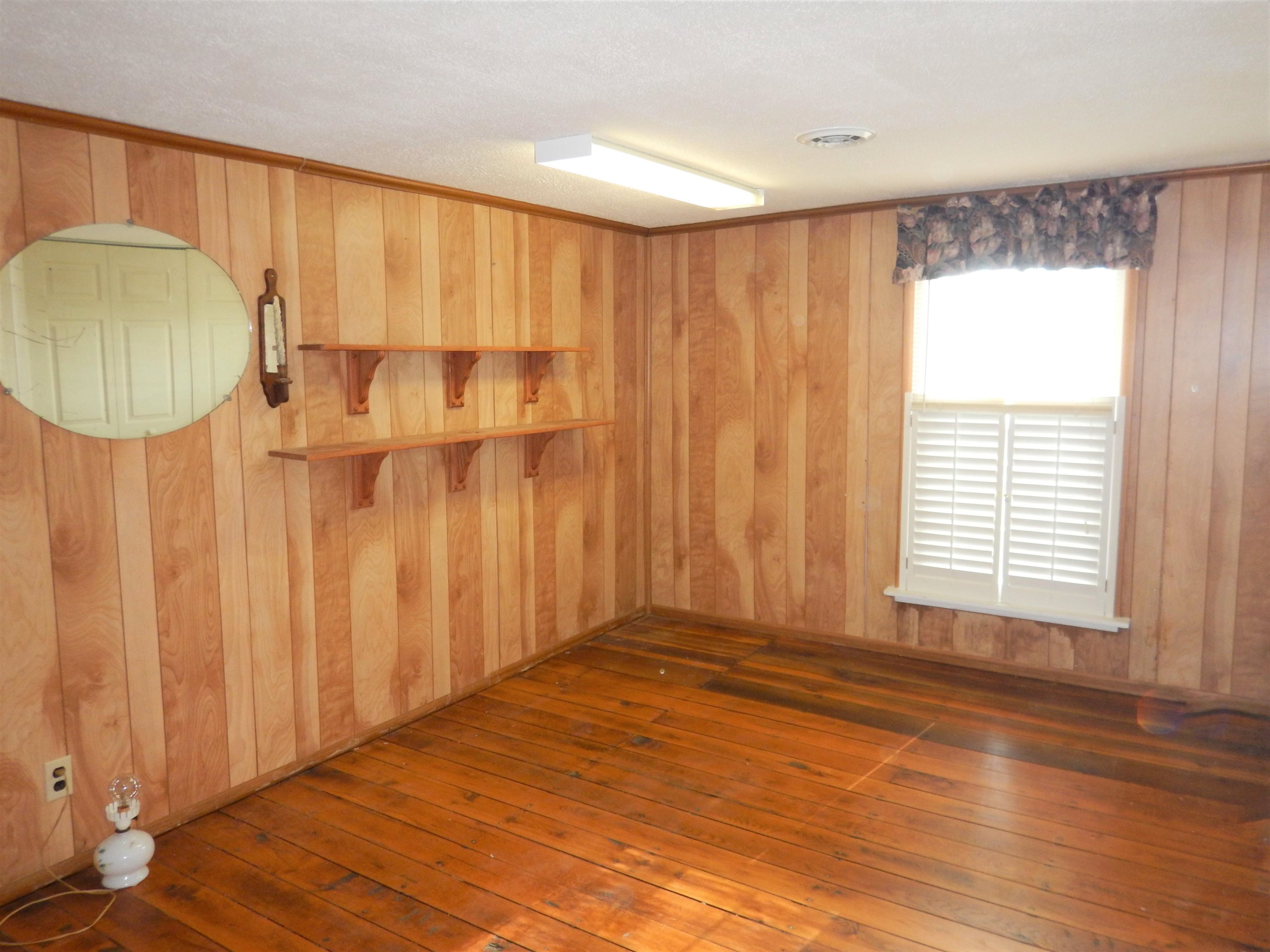 941 McKinley Road Middlebrook, VA 24459 - Photo 20 of 25 a view of a room with wooden floor and chair