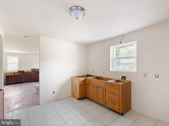 a view of a porch with wooden floor